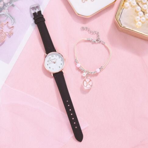 Reloj de Cuarzo Vintage para Mujer – Correa de PU Casual y Deportivo - en la muñeca
